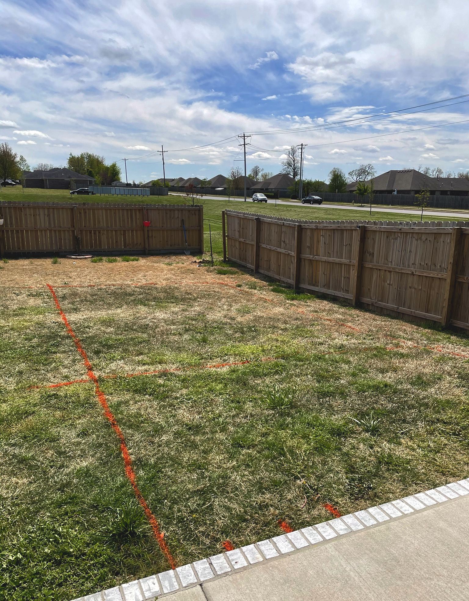 The empty backyard before the pool